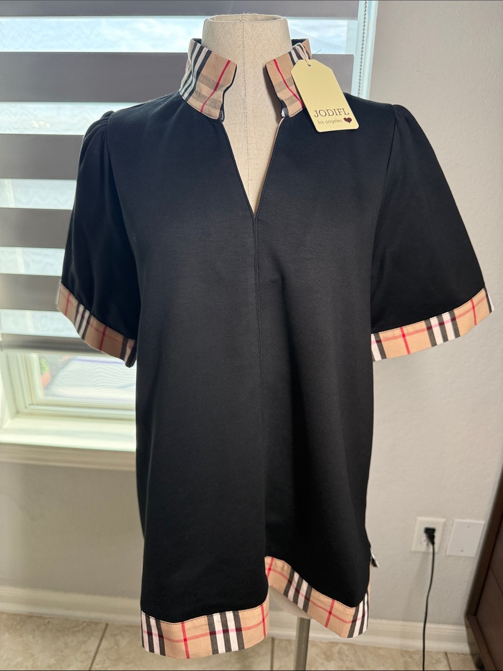 New black and plaid blouse